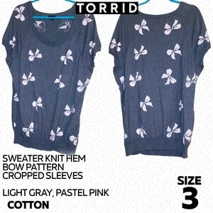 Torrid bow pattern sweater knit top